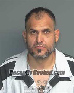 Recent Booking / Mugshot for RAMON REYES-FLORES in Montgomery County, Texas