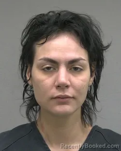 Mugshot of ELISA JOY RIVERA booked in Alachua County, Florida on May 18, 2026