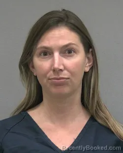 Mugshot of JESSICA CREASMAN HAUFLER booked in Alachua County, Florida on March 14, 2026