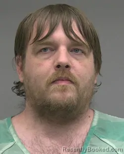 Mugshot of MICHAEL ALLEN KINNEY booked in Alachua County, Florida on March 11, 2026