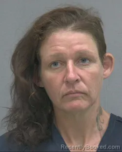 Mugshot of Katie Jung White booked in Alachua County, Florida on October 14, 2026