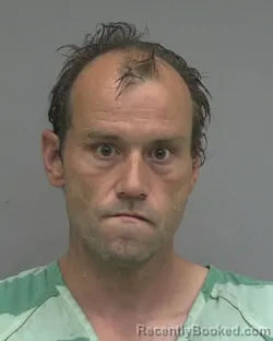 Mugshot of JOHN WILLIAM WILKES booked in Alachua County, Florida on March 26, 2026