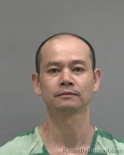 Mugshot of HOA THANH LO booked in Alachua County, Florida on May 22, 2026