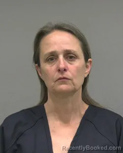 Mugshot of JENNIFER ELISE VANLARE ZIELINSKI booked in Alachua County, Florida on March 12, 2026