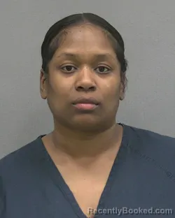 Mugshot of ESSENCE C ROBINSON booked in Alachua County, Florida on March 26, 2026