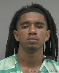 Mugshot of ISSAC SAMUEL CARTER booked in Alachua County, Florida on April 6, 2026