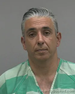 Mugshot of NORBERTO DOMINGUEZ booked in Alachua County, Florida on April 25, 2026