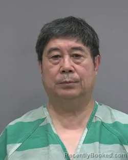 Mugshot of HONGJUN LI booked in Alachua County, Florida on May 24, 2026