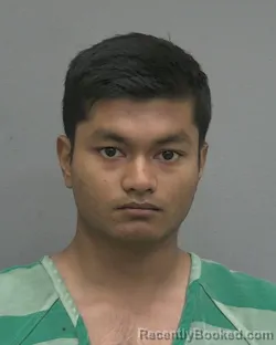 Mugshot of AARON GHOSH booked in Alachua County, Florida on May 26, 2026