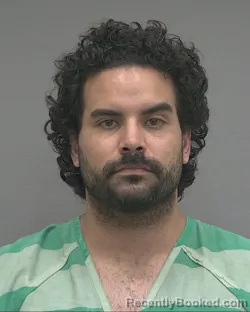 Mugshot of PATRICK ALEXANDRE DESOUZA booked in Alachua County, Florida on July 26, 2026