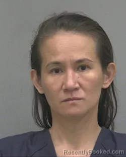 Mugshot of Yen Phoung Thi Nguyen booked in Alachua County, Florida on August 22, 2026