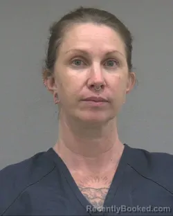 Mugshot of Kimberly Marie Green booked in Alachua County, Florida on August 23, 2026