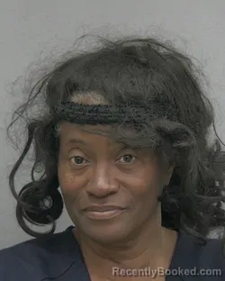 Mugshot of DEBBIE LORRAINE HUNTER booked in Alachua County, Florida on March 20, 2026