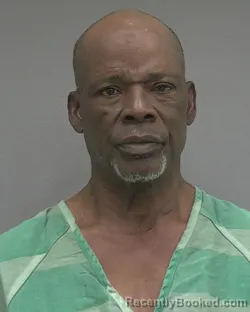 Mugshot of LEONARD ALEXANDER WOODY booked in Alachua County, Florida on July 7, 2026