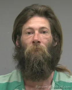 Mugshot of DANIEL JODY RHOADES booked in Alachua County, Florida on March 14, 2026