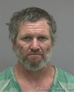 Mugshot of TIMOTHY JASON SUTTON booked in Alachua County, Florida on March 11, 2026