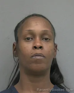 Mugshot of SHALANDA MONIQUE DEXTER booked in Alachua County, Florida on April 30, 2026