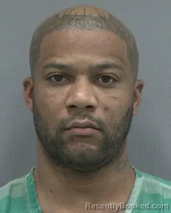 Mugshot of ANDREW KEITH WOODHAM booked in Alachua County, Florida on March 24, 2026