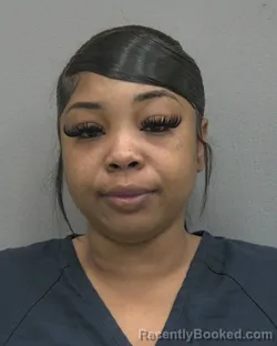 Mugshot of JASMINE NIKERIA BROWN booked in Alachua County, Florida on April 4, 2026