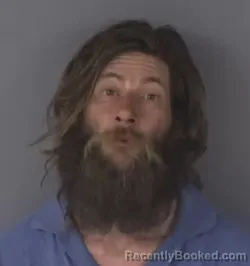 Mugshot of DANIEL RHOADES