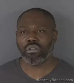 Mugshot of EDWARD HUGHES