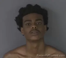 Mugshot of KHRISTOPER HOLCOMB