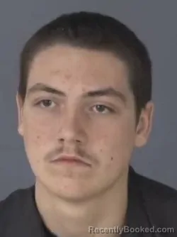 Mugshot of NATHAN THOMPSON