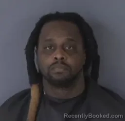 Mugshot of OLAJUWON THOMPSON