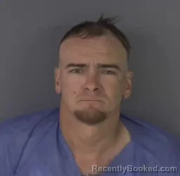 Mugshot of RYAN HEWITT