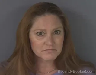 Mugshot of TAMI GILBERT booked in Clay County, Florida on April 7, 2026