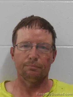 Mugshot of TRAVIS DEAN STAUFFER booked in Henry County, Iowa on March 20, 2026