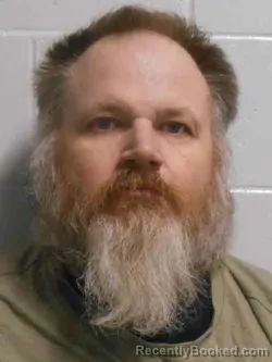 Mugshot of JOSHUA WAYNE PHILLIPS booked in Henry County, Iowa on March 28, 2026