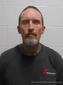 Mugshot of KENNY EDWARD BELLAMY booked in Henry County, Iowa on March 23, 2026