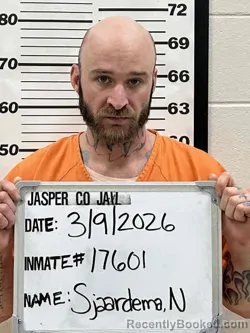 Mugshot of NATHANIEL JOEL SJAARDEMA booked in Jasper County, Iowa on March 7, 2026