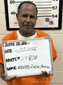 Mugshot of DANIEL LEMA WOLDSILASIE booked in Jasper County, Iowa on April 22, 2026