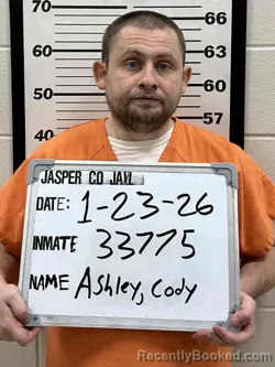 Booking photo from Jasper County, Iowa