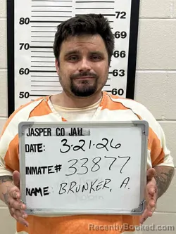 Mugshot of ALEXANDER GAYLORD BRUNKER booked in Jasper County, Iowa on March 21, 2026