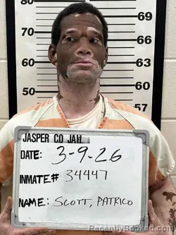 Mugshot of SCOTT MAWONE PATRICO booked in Jasper County, Iowa on March 8, 2026