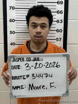 Mugshot of FADEL JAMES PAYTON MOORE booked in Jasper County, Iowa on March 20, 2026