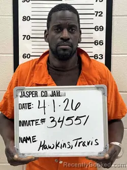 Mugshot of TRAVIS JAMES HAWKINS booked in Jasper County, Iowa on April 1, 2026