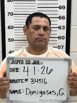 Mugshot of GUSTAVO ADOLFO DOMIGUSES booked in Jasper County, Iowa on April 1, 2026