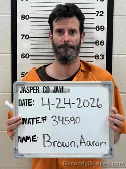 Mugshot of AARON EDWIN BROWN booked in Jasper County, Iowa on April 24, 2026