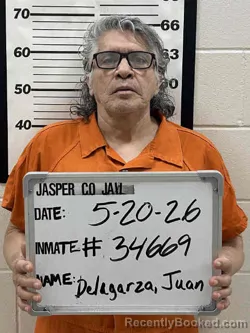 Mugshot of JUAN ENRIQUE DELAGARZA booked in Jasper County, Iowa on May 20, 2026