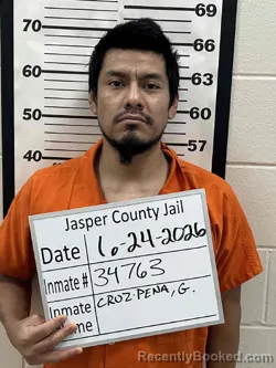Mugshot of GUSTAVO CRUZ PENA booked in Jasper County, Iowa on June 24, 2026