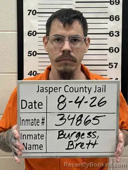 Mugshot of BRETT ELWYN BURGESS booked in Jasper County, Iowa on August 4, 2026