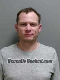Booking photo from Lee County, Iowa