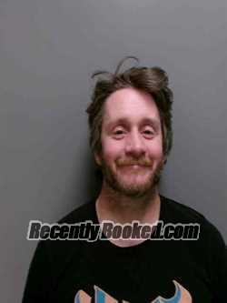 Booking photo from Lee County, Iowa