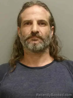 Mugshot of DOUGLAS ALAN JUNIOR MCPHERSSON booked in Lee County, Iowa on August 1, 2026