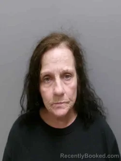 Mugshot of BELINDA LEA GREER booked in Lee County, Iowa on April 13, 2026