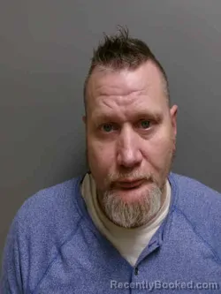 Booking photo from Lee County, Iowa